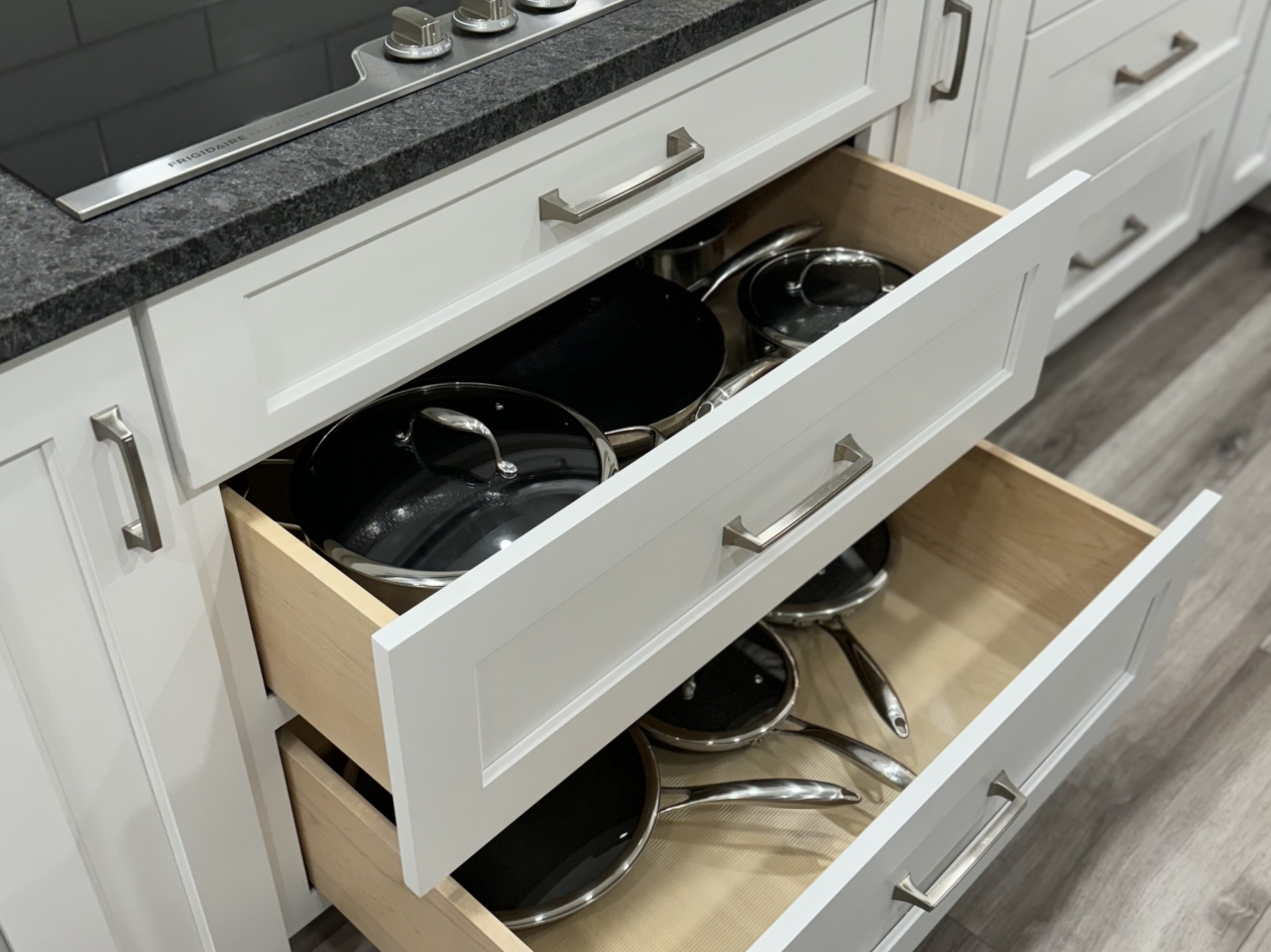 Hampshire cabinets, drawers below cook top
