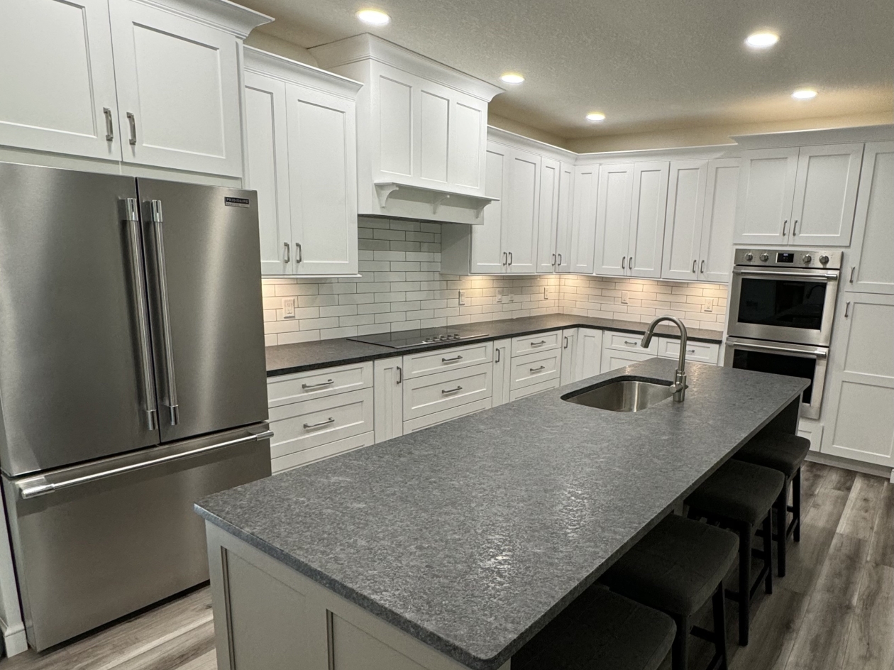 Hampshire cabinets, painted maple, large island, leather granite, double oven