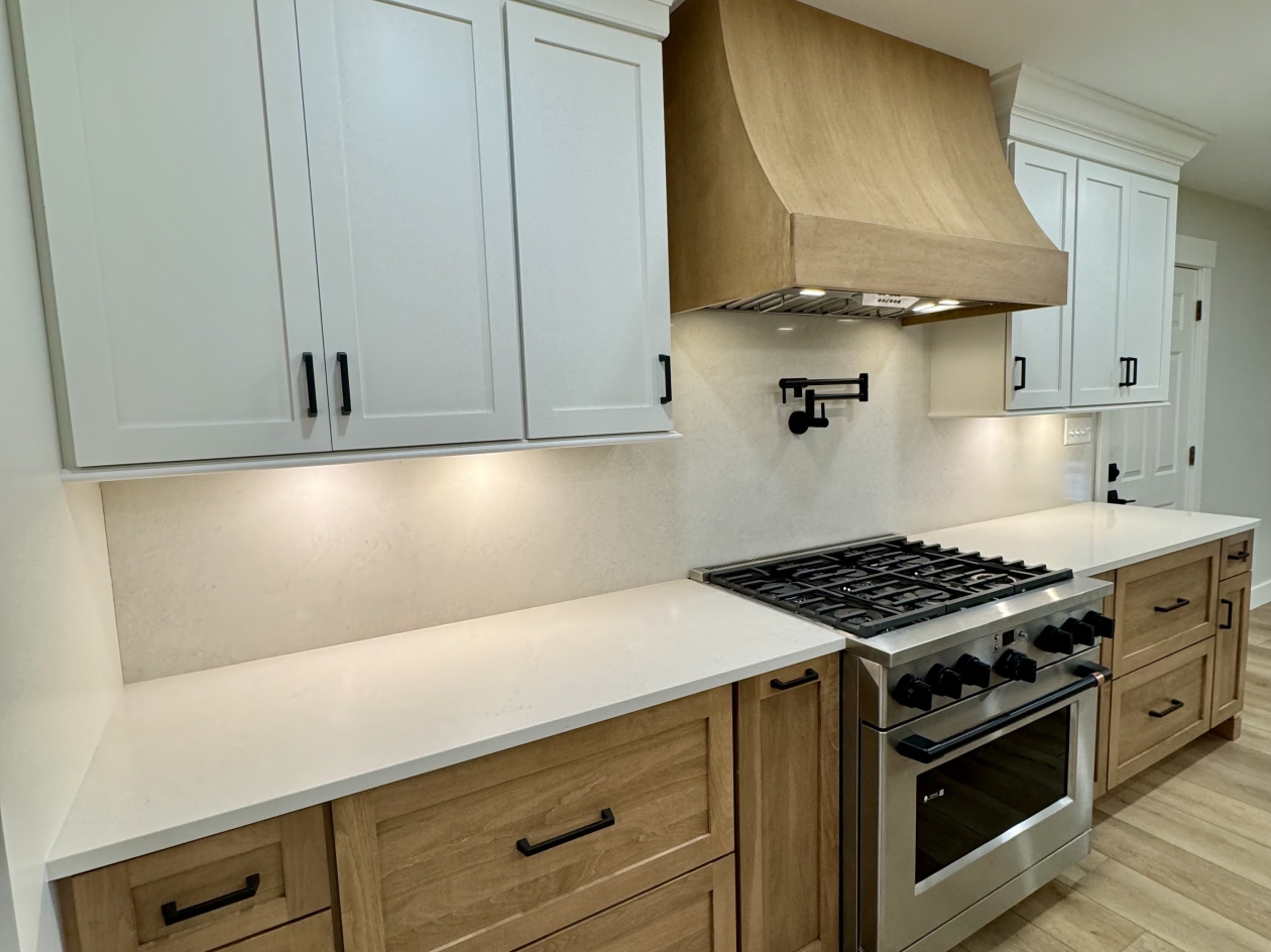 Hampshire cabinets, crown molding, custom hood, stained and painted maple