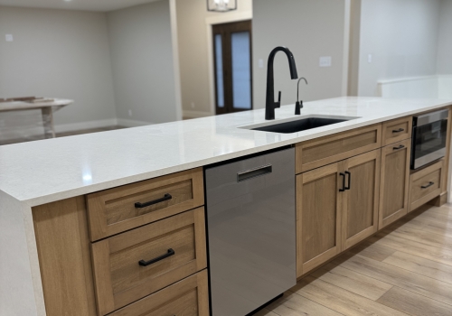 slide: Hampshire cabinets, crown molding, custom hood, stained and painted maple
