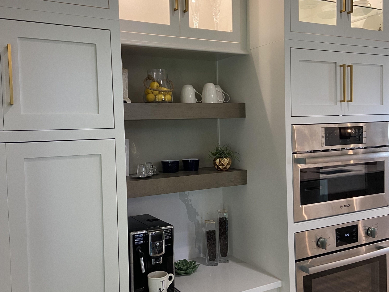 Mouser Cabinetry, painted maple, double oven, floating shelves, brushed gold hardware