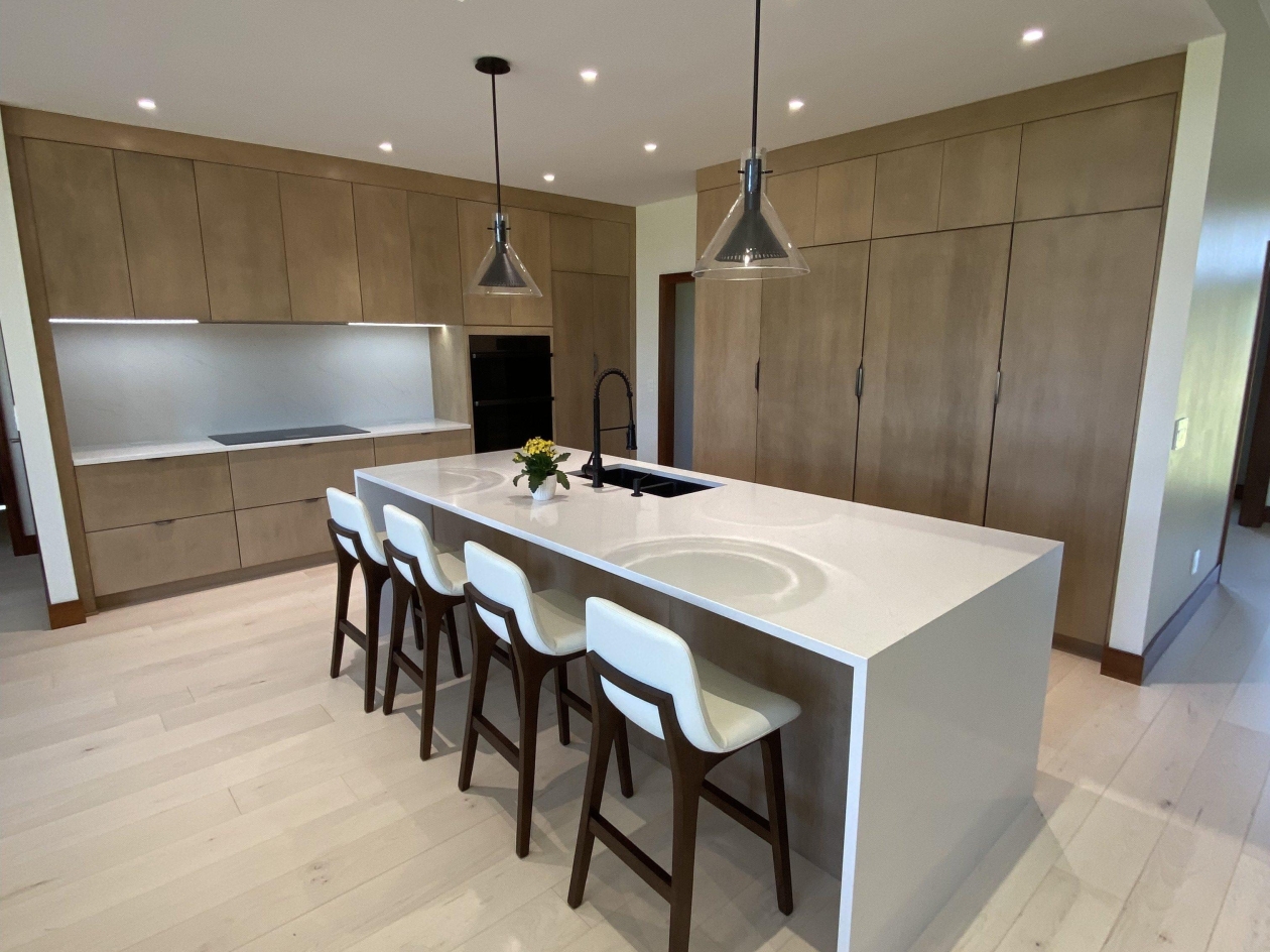 Mouser cabinetry, Euro style cabinets, waterfall countertop, custom island