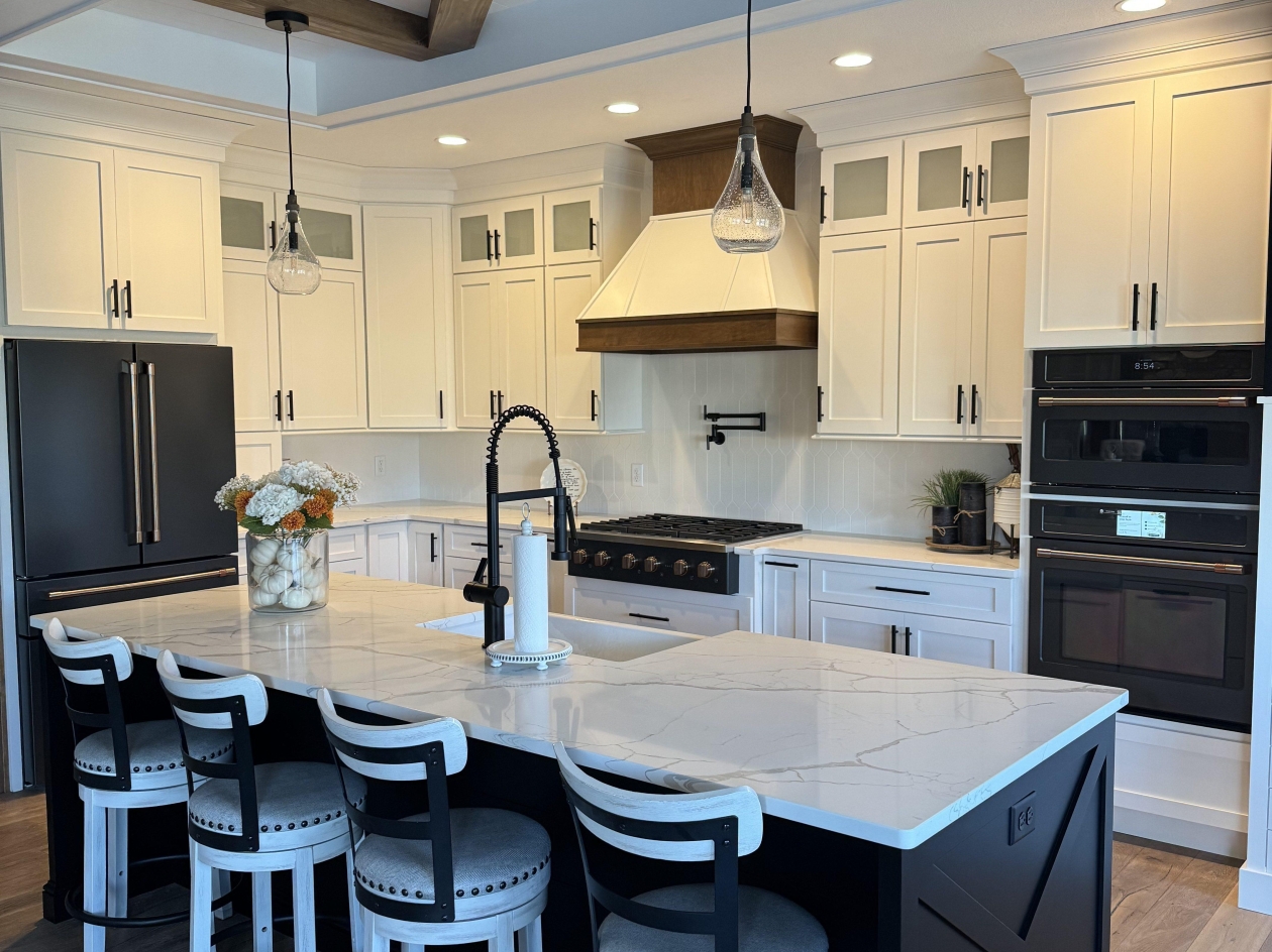 Hampshire cabinets, black island, custom hood, painted maple, stacked wall cabinets